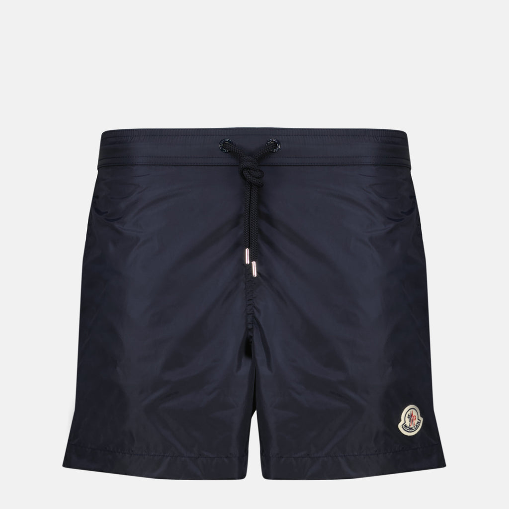 Image of Blue Bathing Suit with Black Logo by Moncler for Men - Season Spring-Summer 2026 - Front View
