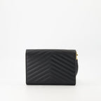 Cassandre pouch, Saint Laurent accessory, black leather pouch, designer handbag, stylish wristlet