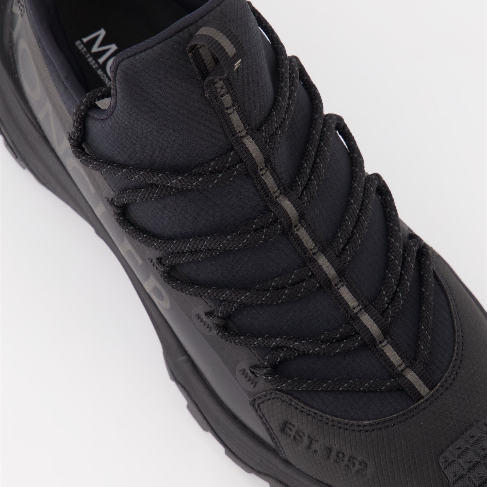 luxury sneakers, Moncler Trailgrip Lite 2, ripstop stretch, black sneakers, high-end footwear