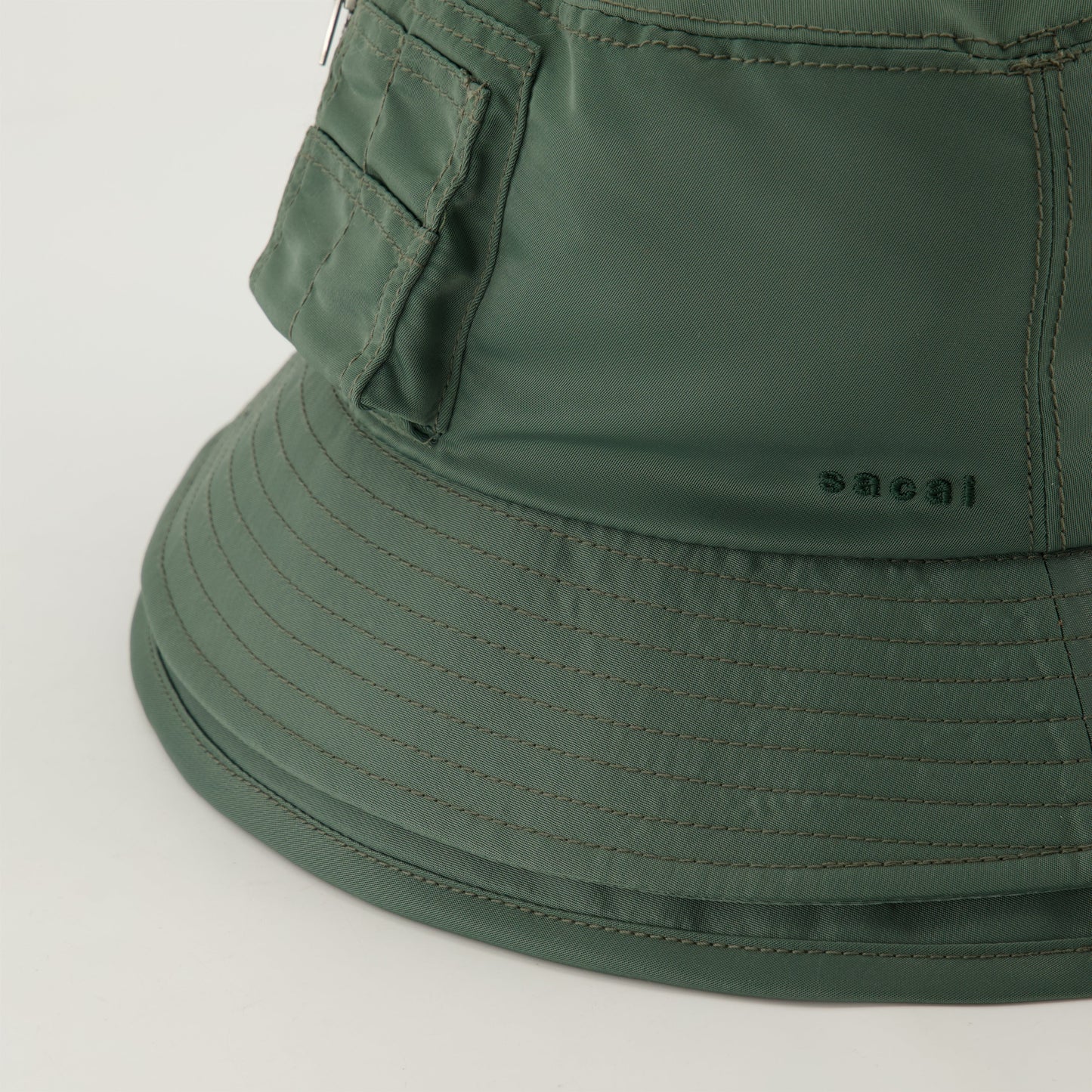 Green bucket hat, Sacai bucket hat, embroidered logo hat, layered design hat, seasonal accessories