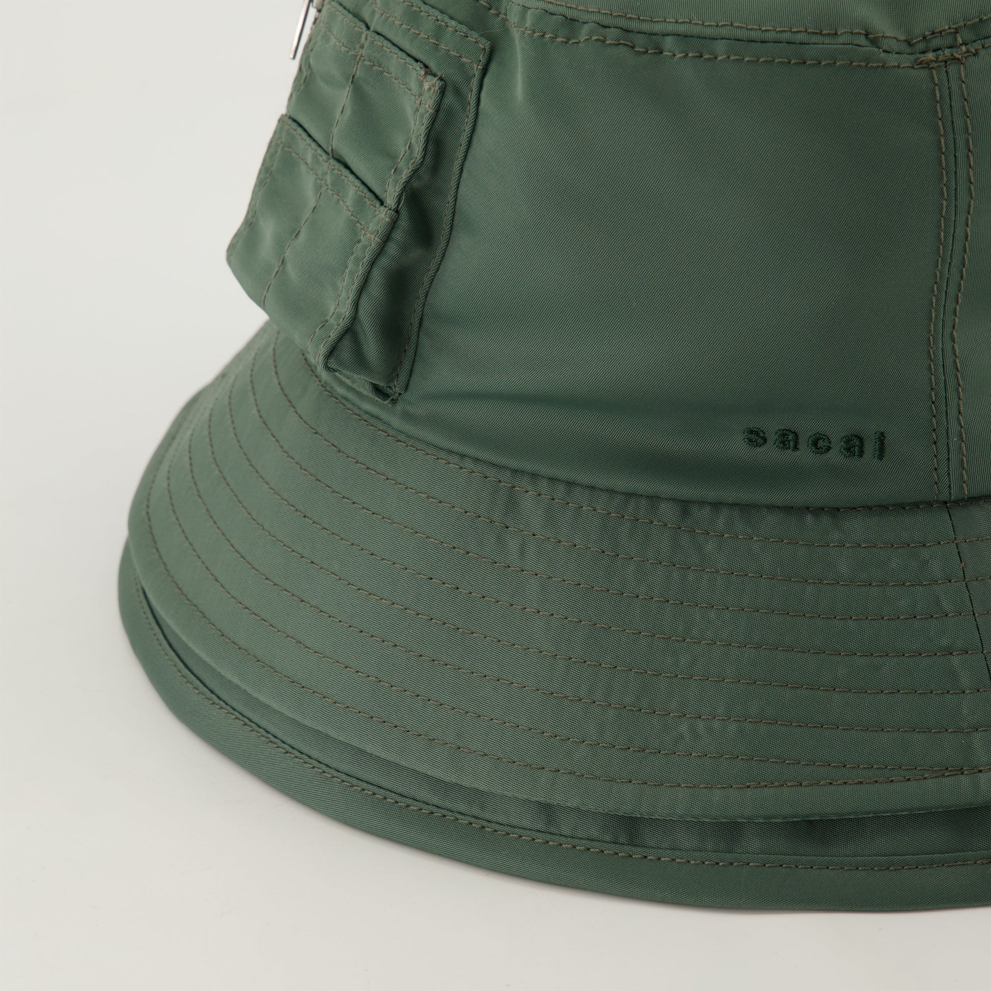 Green bucket hat, Sacai bucket hat, embroidered logo hat, layered design hat, seasonal accessories