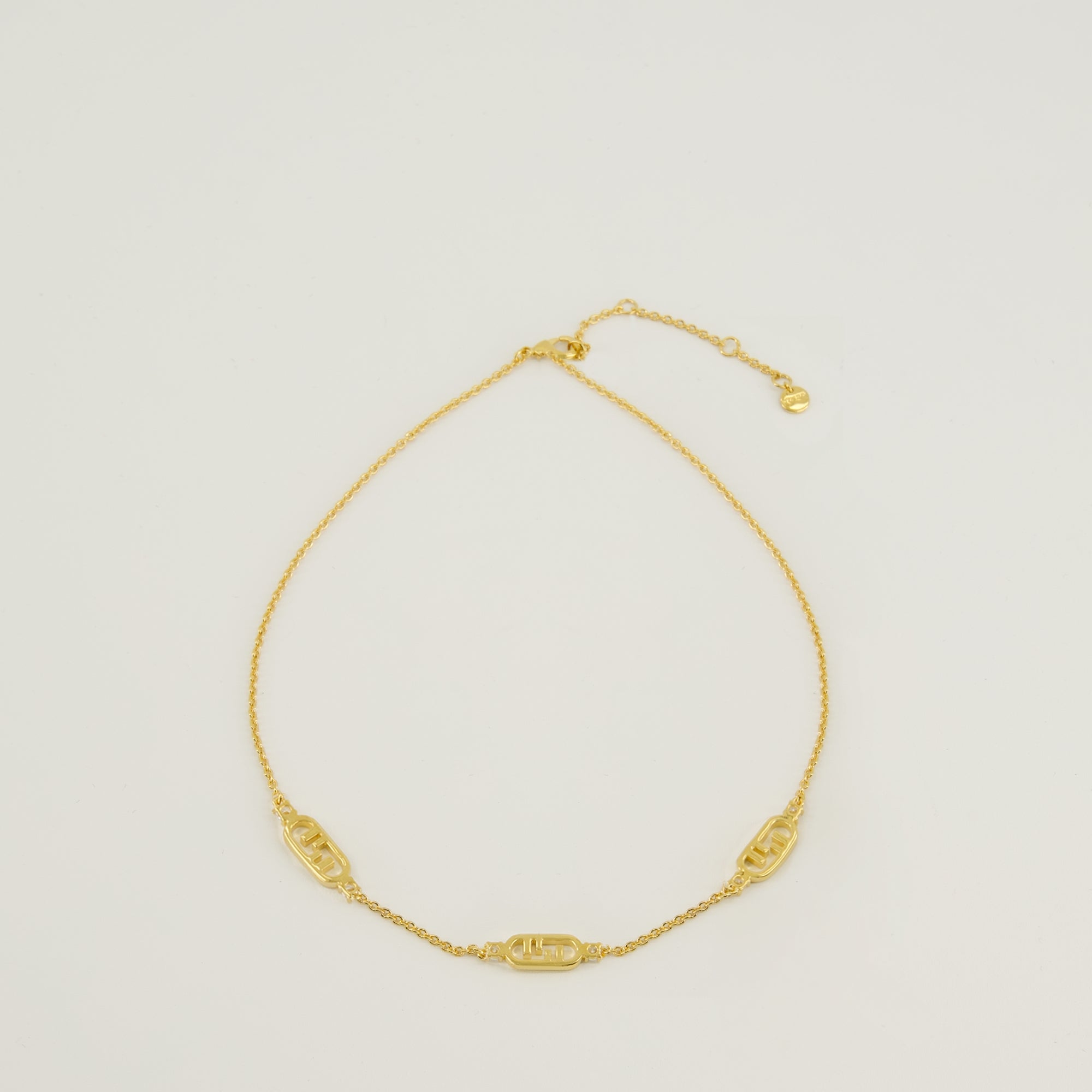 Fendi necklace, O'lock jewelry, golden necklace, brass accessories, crystal necklace