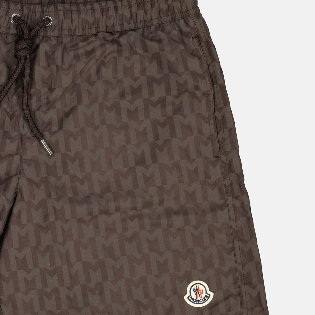 Monogram swim shorts, brown swim shorts, designer swimwear, Moncler shorts, men's swim fashion