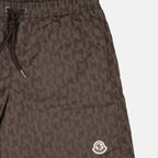 Monogram swim shorts, brown swim shorts, designer swimwear, Moncler shorts, men's swim fashion