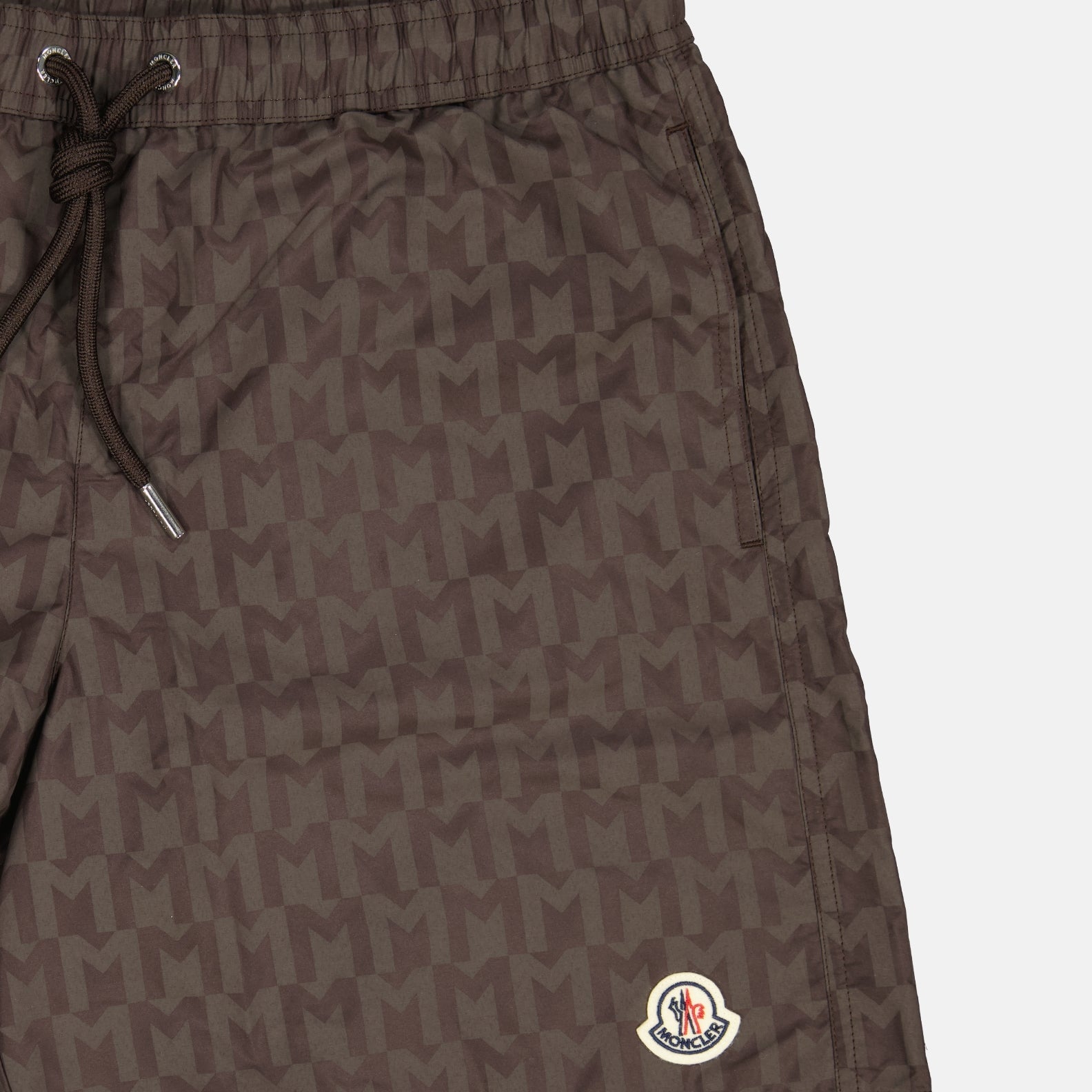 Monogram swim shorts, brown swim shorts, designer swimwear, Moncler shorts, men's swim fashion