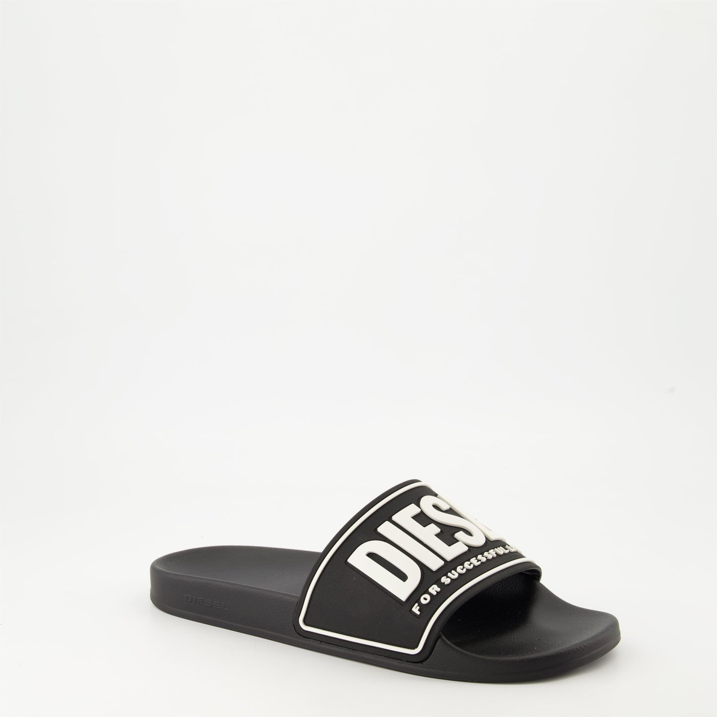 luxury slides, black slides, designer footwear, Diesel Autumn-Winter 2024, comfortable molded sole