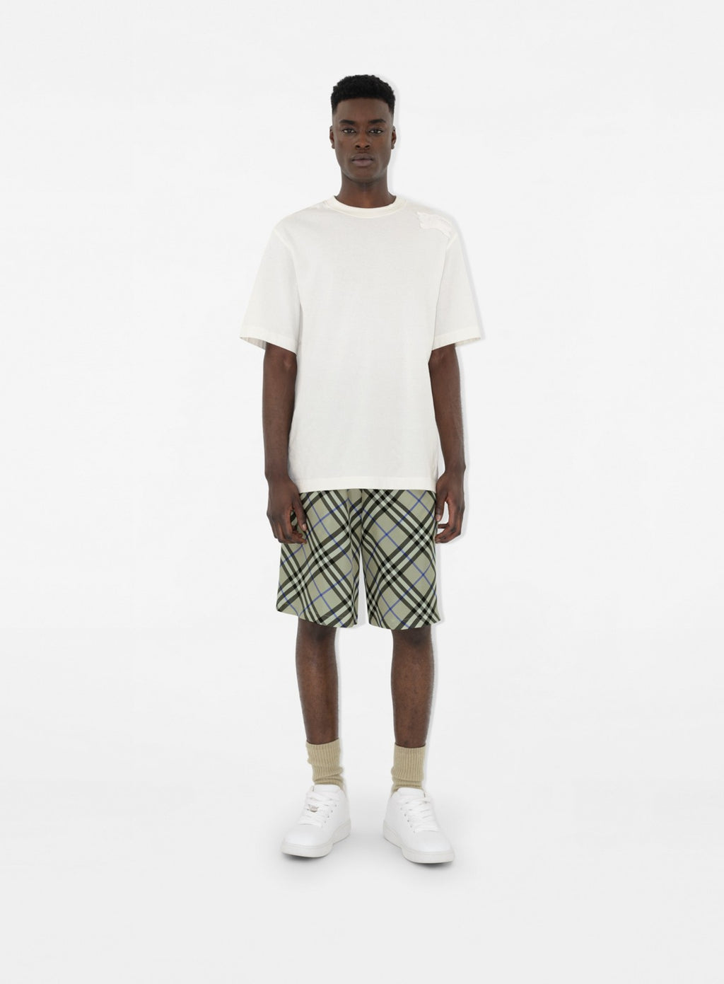 White leather sneakers, Burberry EKD, luxury footwear, stylish sneakers, elegant leather sneakers