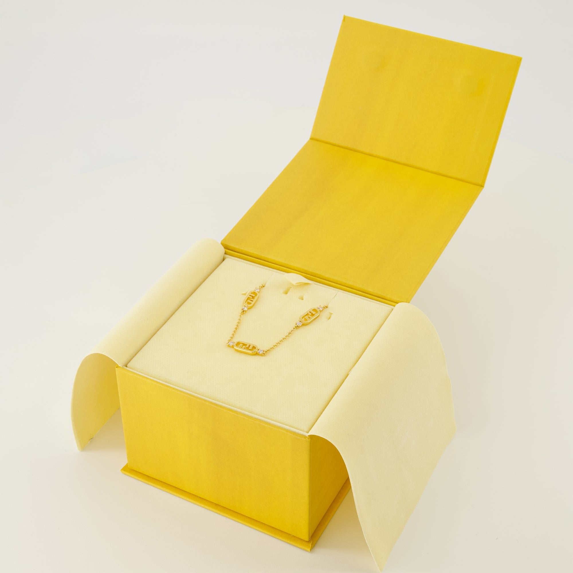 Fendi necklace, O'lock jewelry, golden necklace, brass accessories, crystal necklace