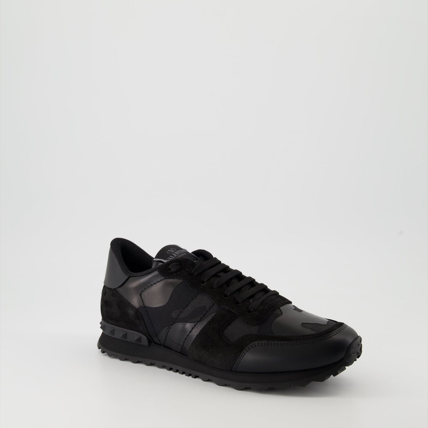 Valentino Garavani sneakers, Rockrunner leather sneakers, luxury footwear, black suede sneakers, high-end sneakers