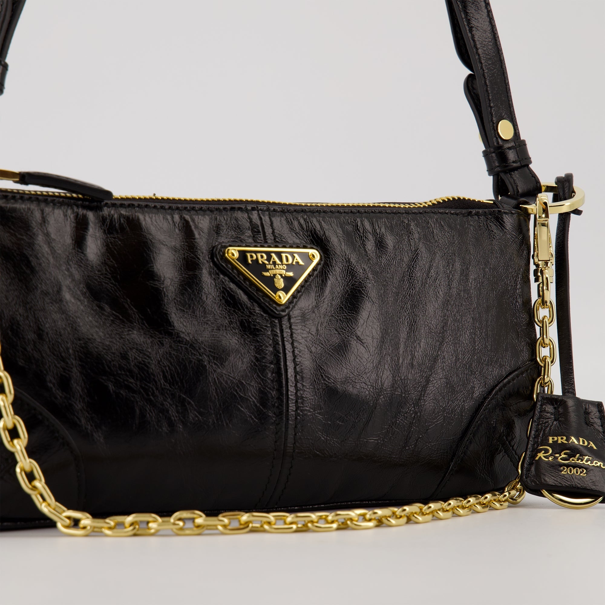 Prada handbag, Le Sac Re-Edition 2002, black leather bag, designer accessories, contemporary style bag