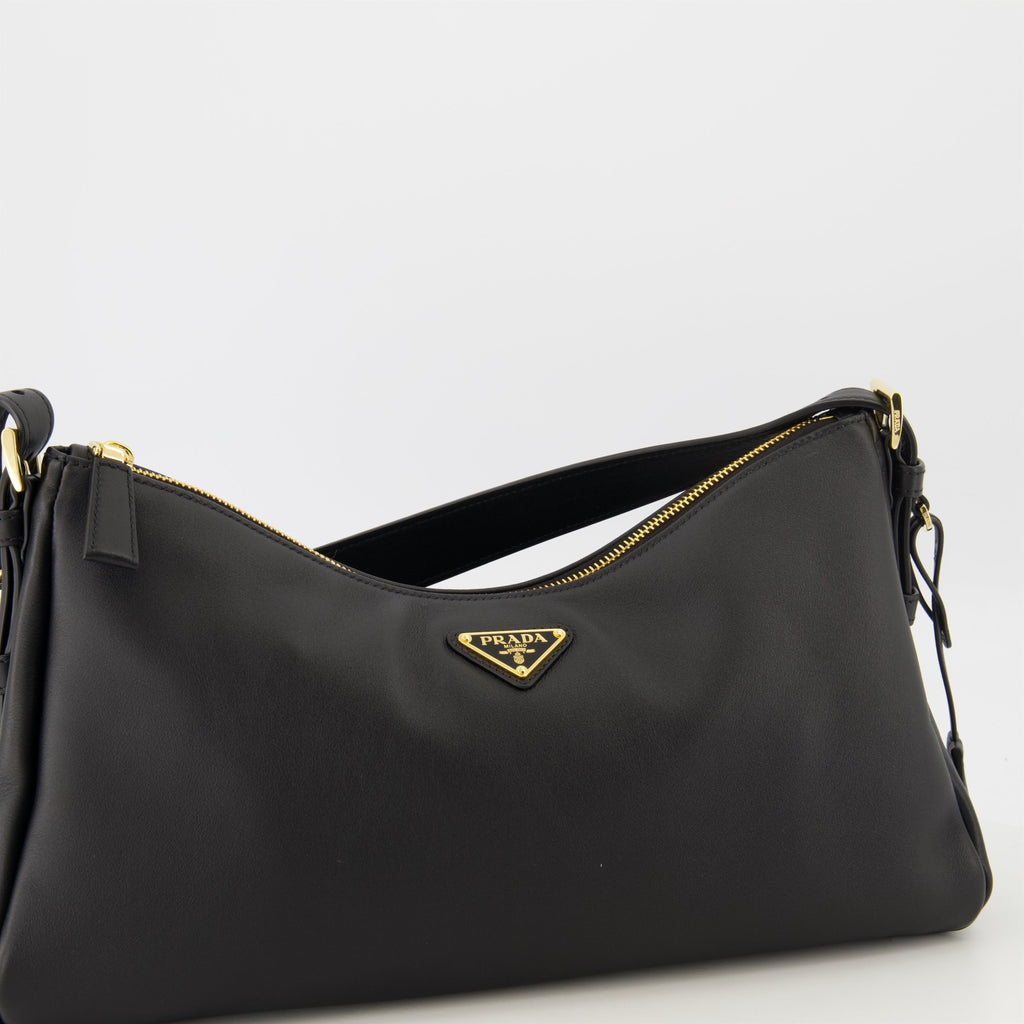 Prada, Sac Aimée, black leather bag, luxury accessories, contemporary design