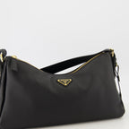 Prada, Sac Aimée, black leather bag, luxury accessories, contemporary design