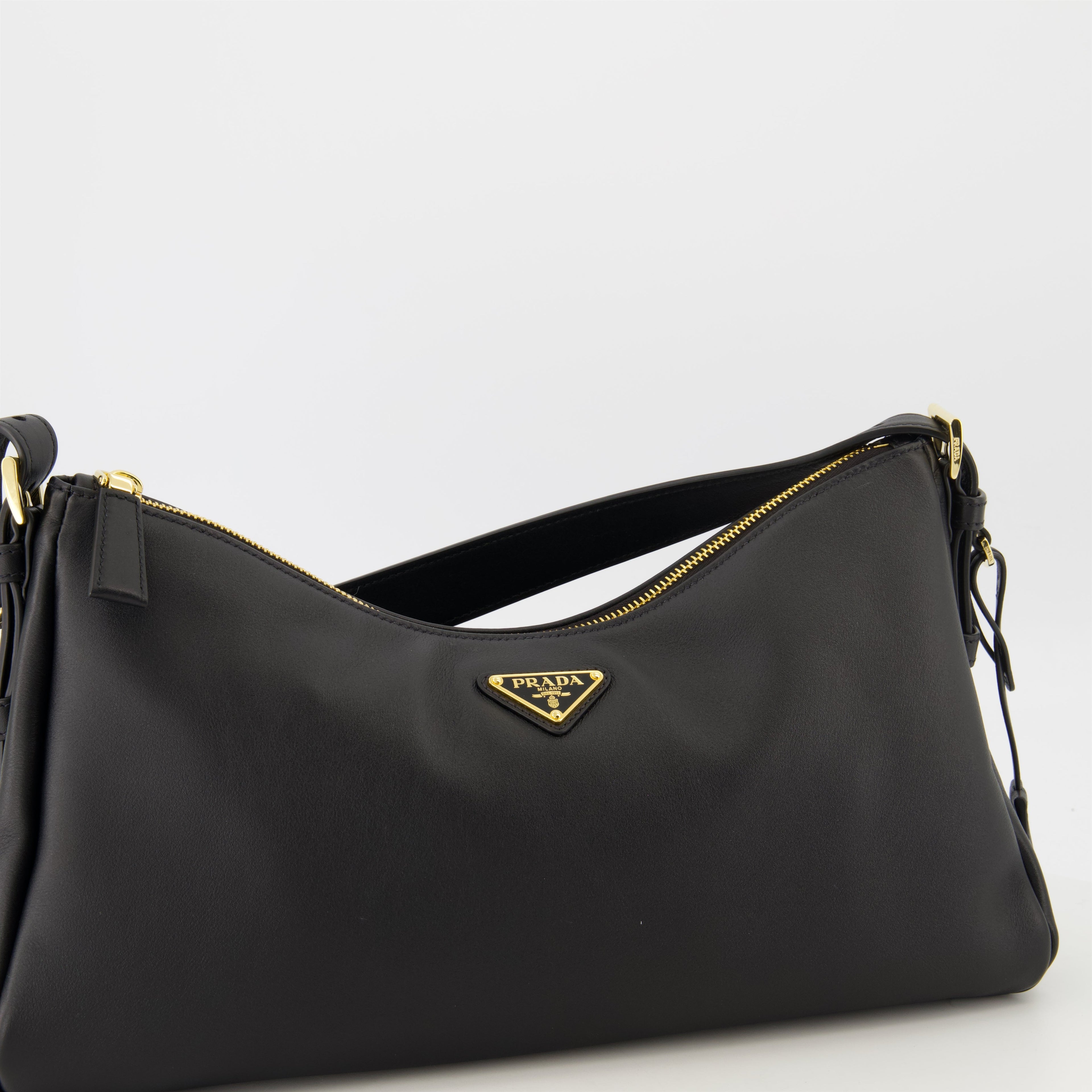 Prada, Sac Aimée, black leather bag, luxury accessories, contemporary design