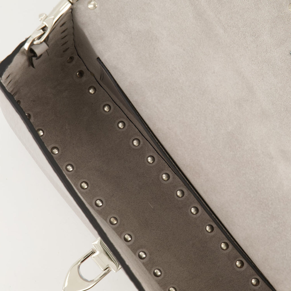 crossbody bag, gray leather bag, studded handbag, luxury accessory, designer handbag