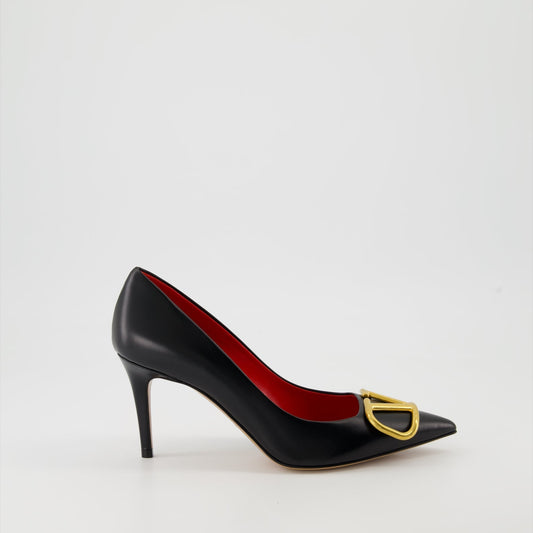   Valentino Garavani, black leather pumps, pointed-toe shoes, high-end fashion, luxury footwear