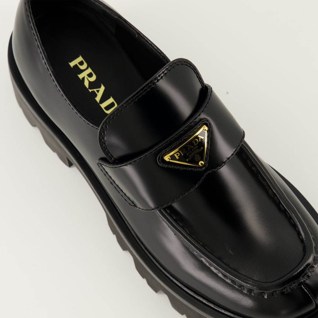 Prada moccasins, black leather shoes, slip-on footwear, rounded toe moccasins, Autumn-Winter collection