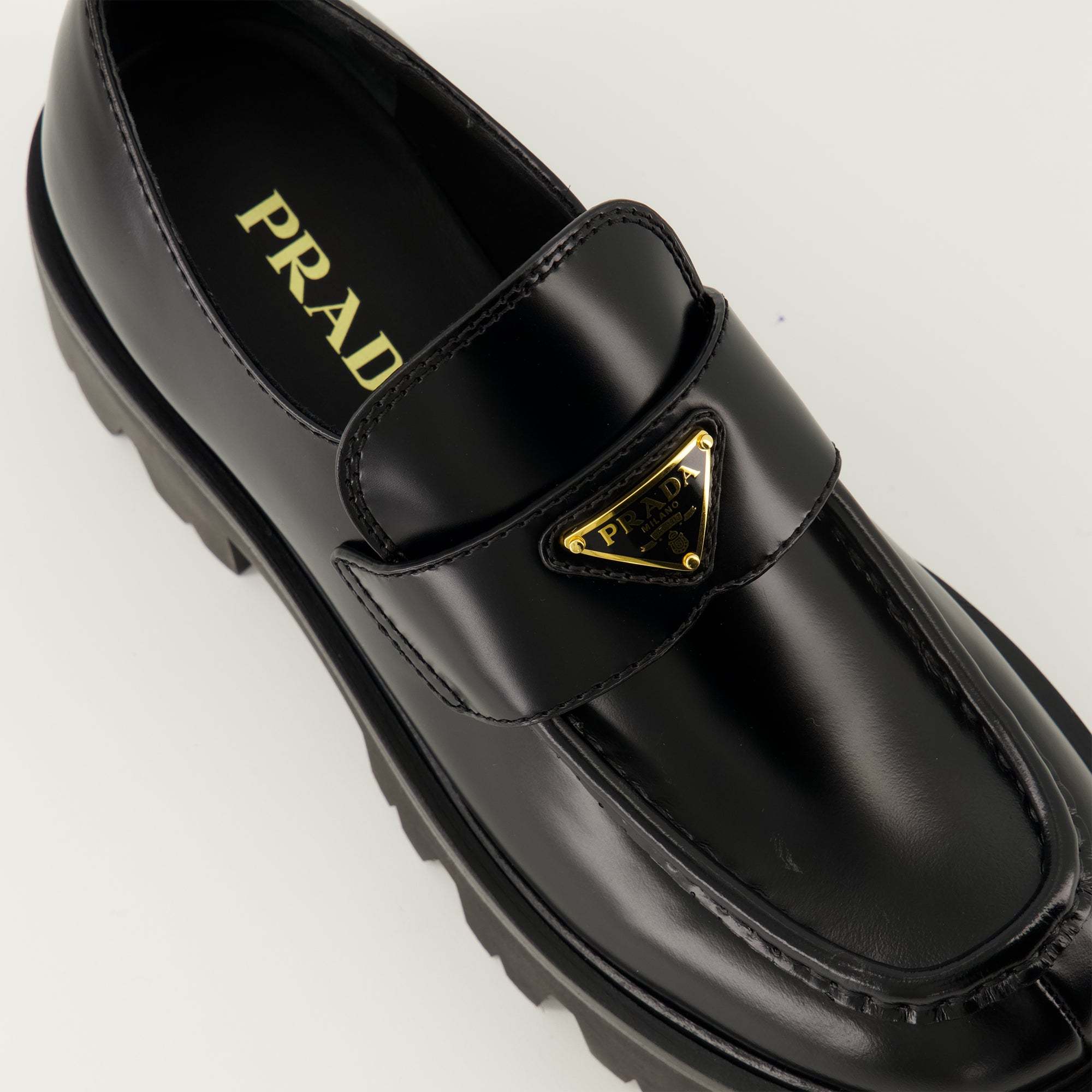 Prada moccasins, black leather shoes, slip-on footwear, rounded toe moccasins, Autumn-Winter collection