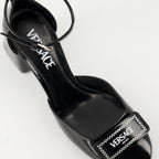 black patent leather heels, Versace shoes, adjustable ankle strap heels, elegant footwear, Spring-Summer collection