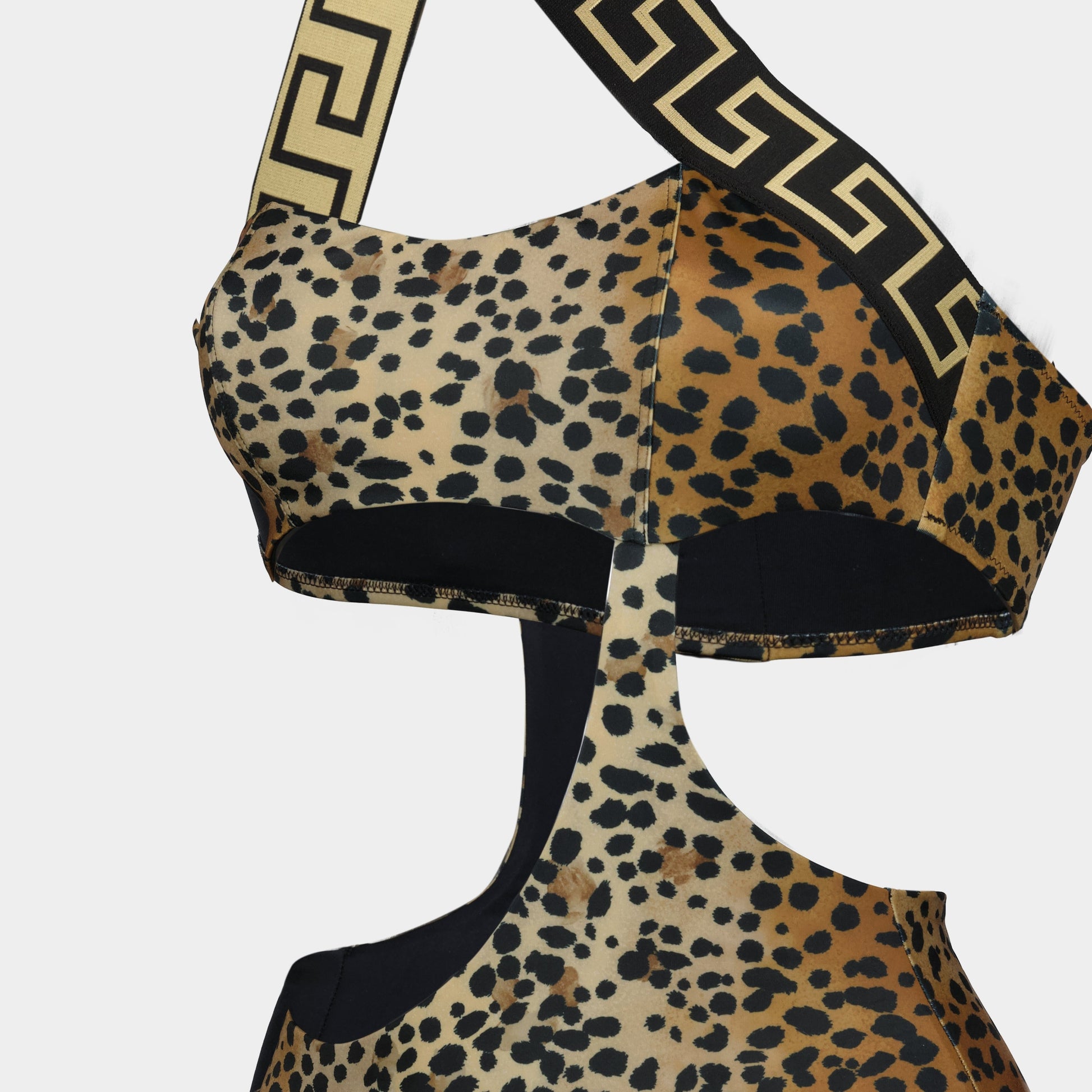 leopard swimsuit, asymmetrical swimwear, Versace swim, designer beachwear, Medusa Greca emblem