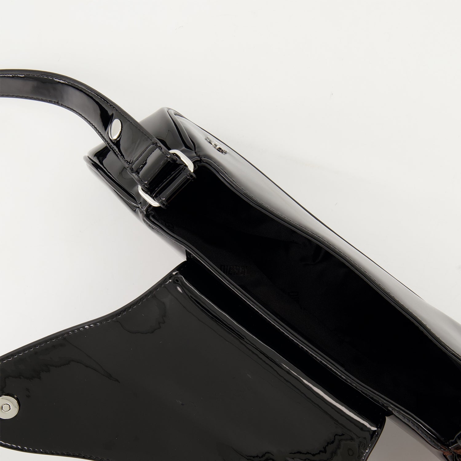 asymmetrical shoulder bag, black glossy bag, designer shoulder bag, adjustable strap bag, Diesel shoulder bag