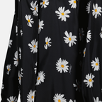 Image de chemise florale en soie noire de Moschino pour femmes - Saison printemps-été 2025 - Détail vue 1
