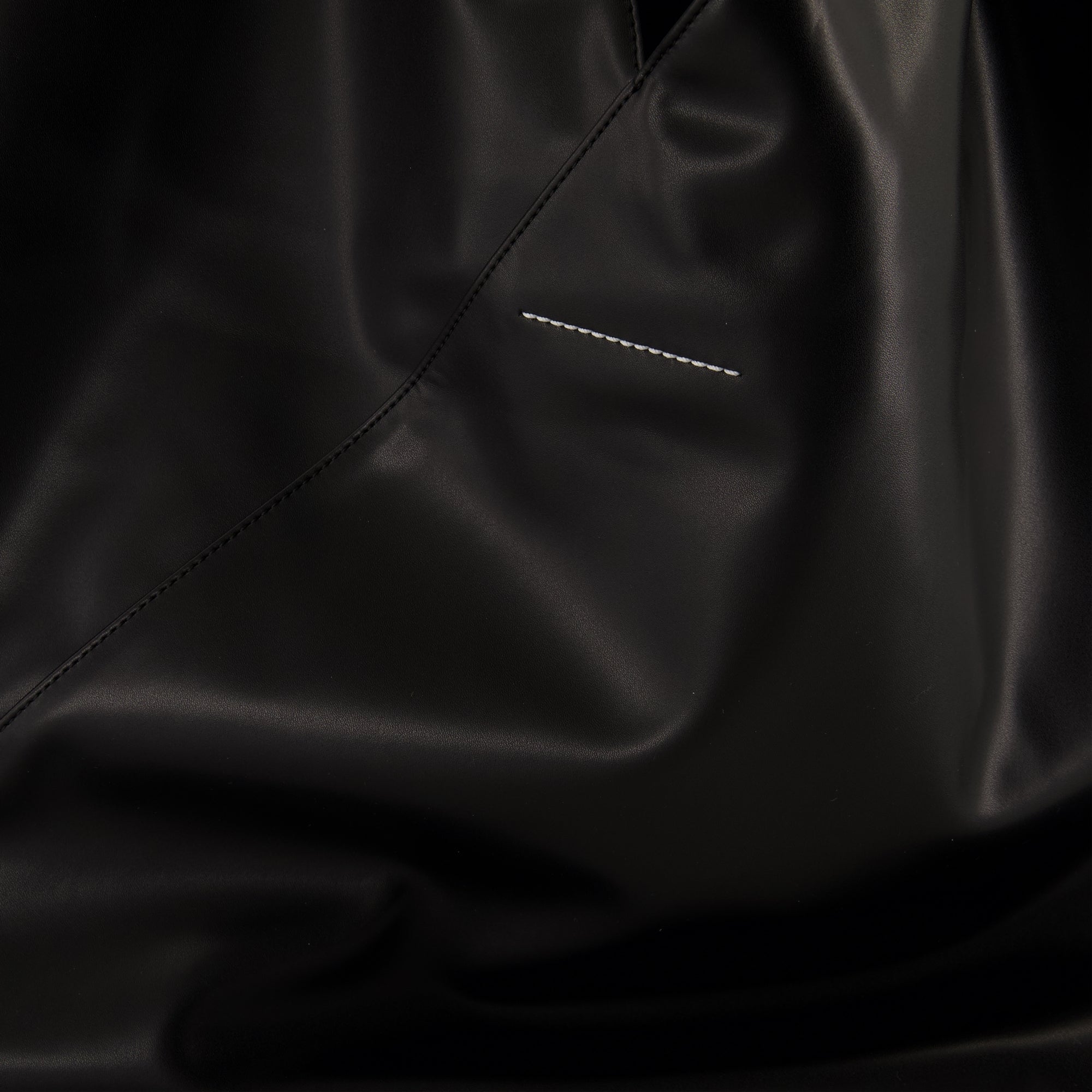 black leather bag, triangular bag, MM6 accessories, Autumn Winter 2025 collection, designer tote