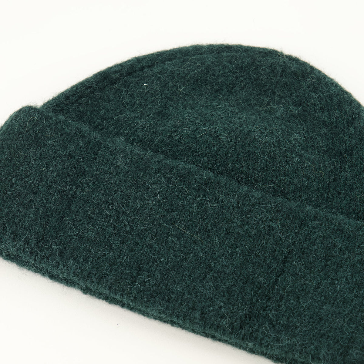 Berretto verde in maglia di alpaca