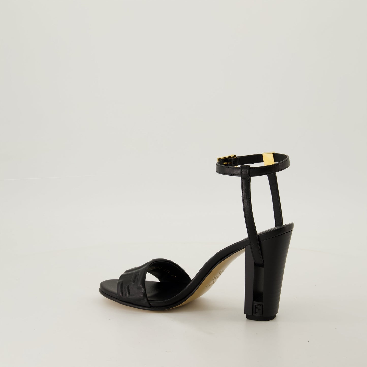 black leather sandals, high heel sandals, adjustable ankle straps, oversized sole, Fendi sandals