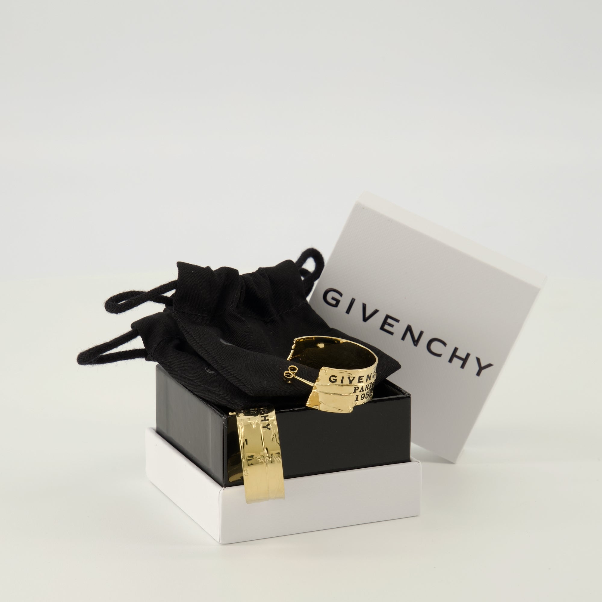 Givenchy earrings, brushed metal earrings, gold earrings, fashion accessories, Givenchy Tape collection