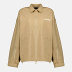 beige windbreaker, Miu Miu outerwear, spring-summer 2026 collection, technical polyester jacket, stylish windbreaker