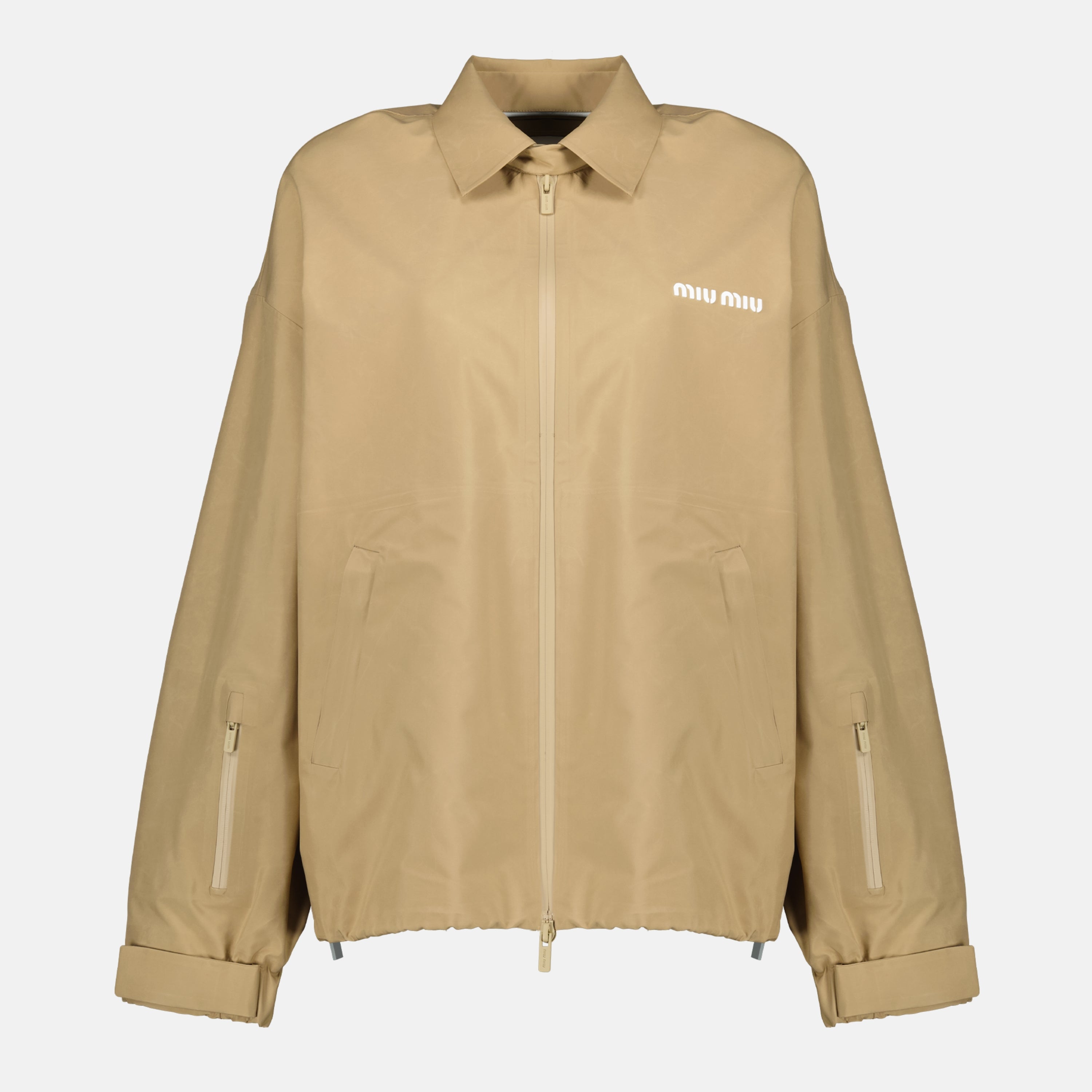 beige windbreaker, Miu Miu outerwear, spring-summer 2026 collection, technical polyester jacket, stylish windbreaker