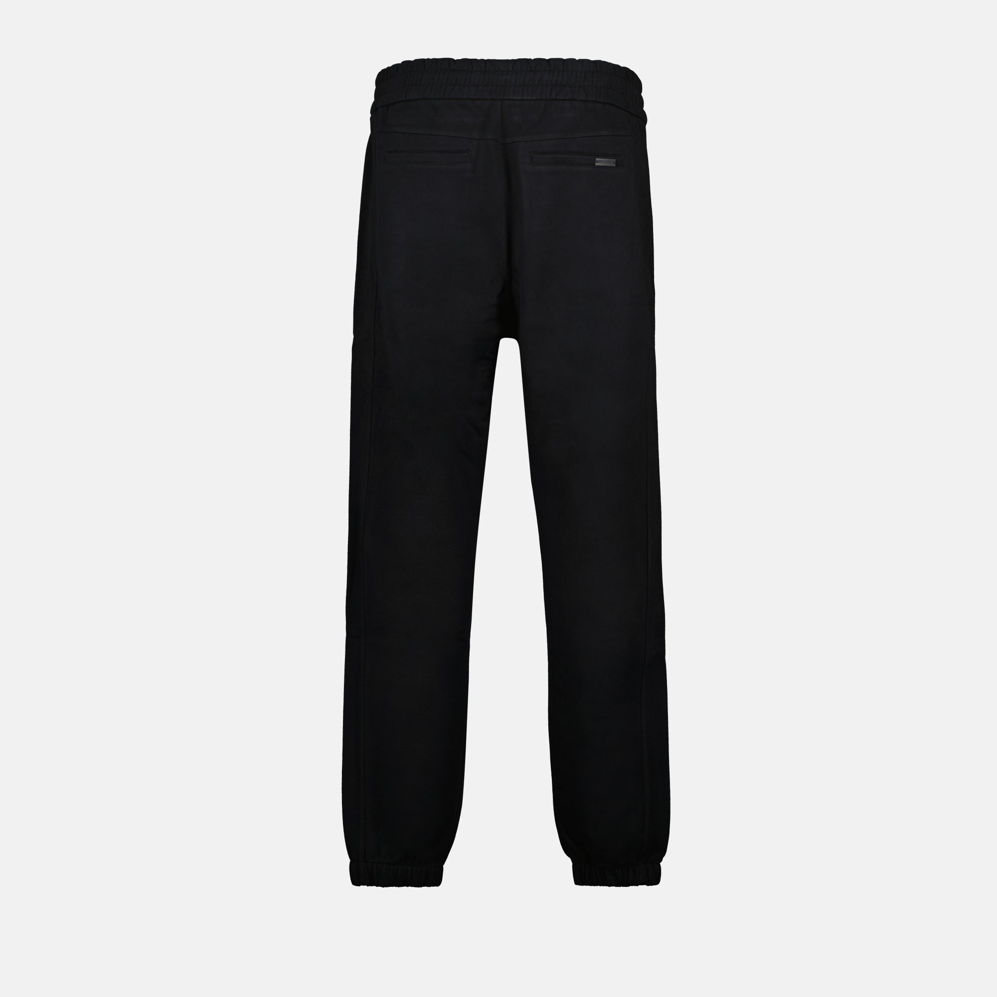 Image of Black Cotton Jogger Pants by Saint Laurent for Men - Season Autumn-Winter 2024 - Back View