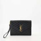 Cassandre pouch, Saint Laurent accessory, black leather pouch, designer handbag, stylish wristlet