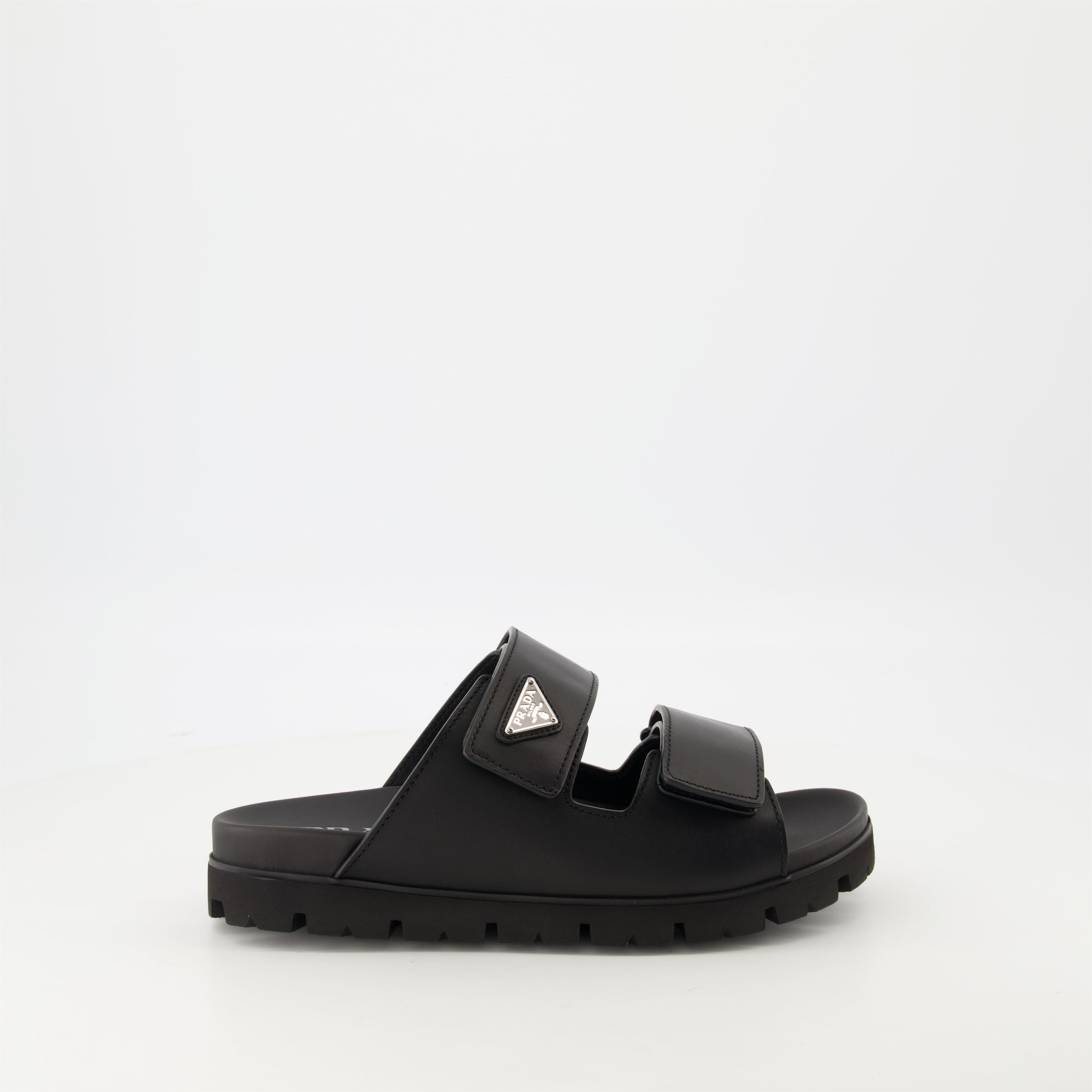 black leather slides, Prada slides, men's leather footwear, stylish casual shoes, comfortable leather sandals