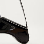asymmetrical shoulder bag, black glossy bag, designer shoulder bag, adjustable strap bag, Diesel shoulder bag