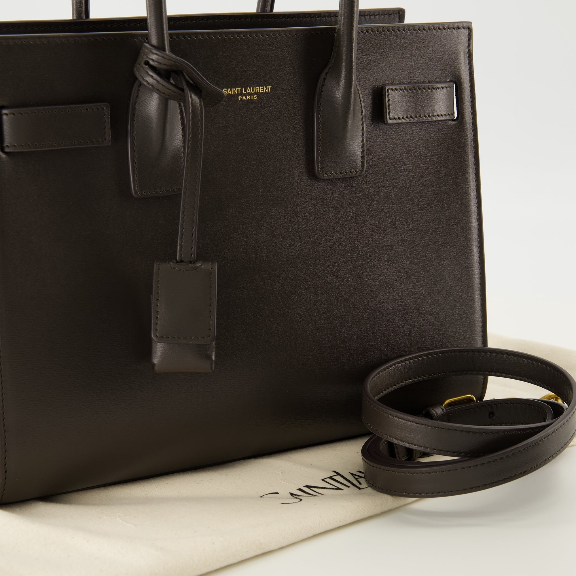 brown leather handbag, Saint Laurent bag, high-quality handbag, elegant handbag, structured handbag