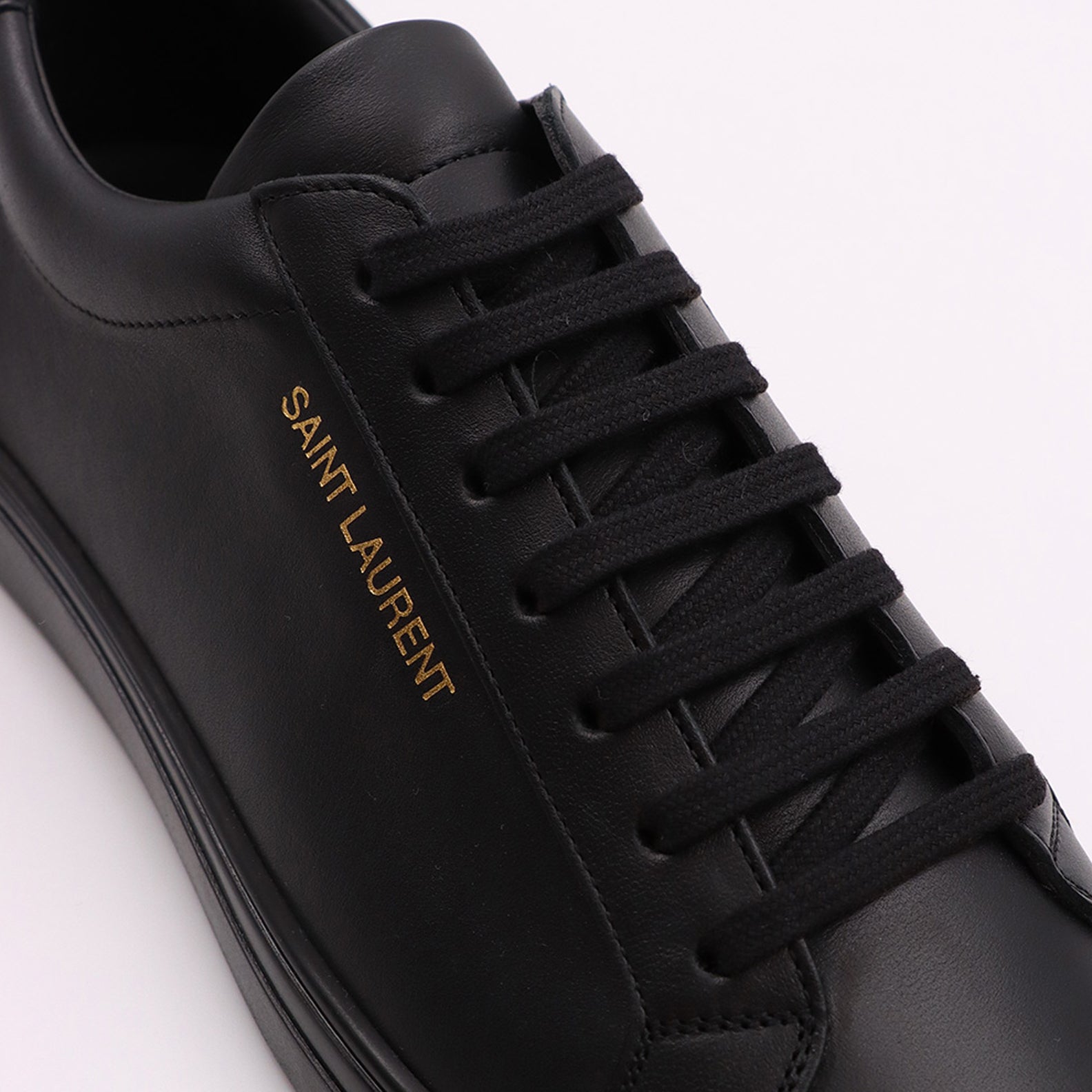 luxury sneakers, smooth leather, Saint Laurent sneakers, elegant footwear, designer sneakers