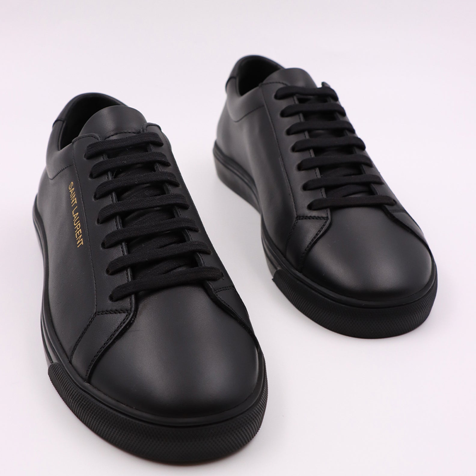 luxury sneakers, smooth leather, Saint Laurent sneakers, elegant footwear, designer sneakers