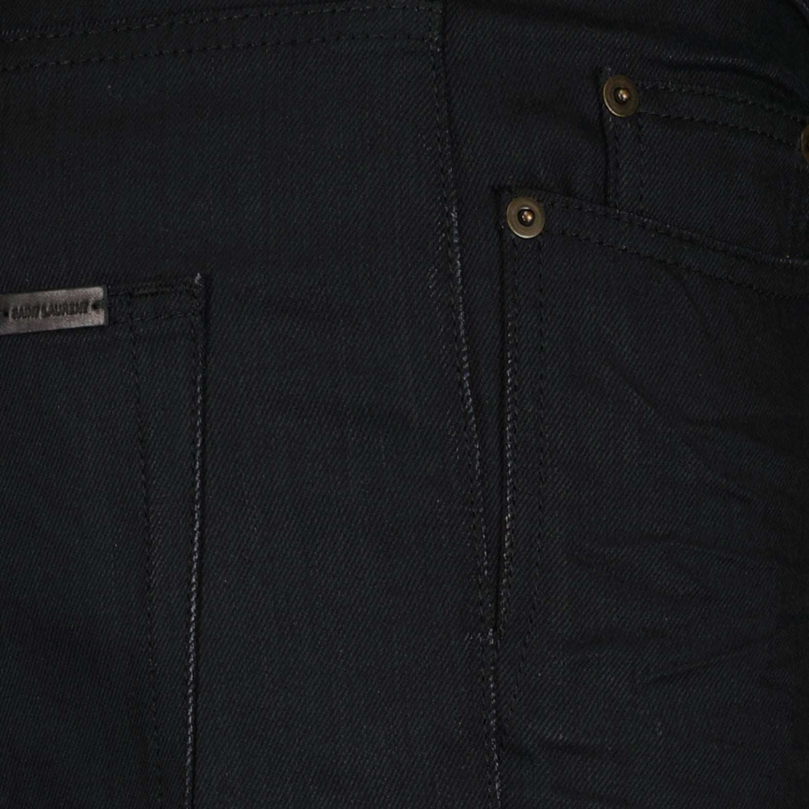 Saint Laurent jeans, black slim-fit jeans, high-end denim, luxury jeans, fashion-forward jeans