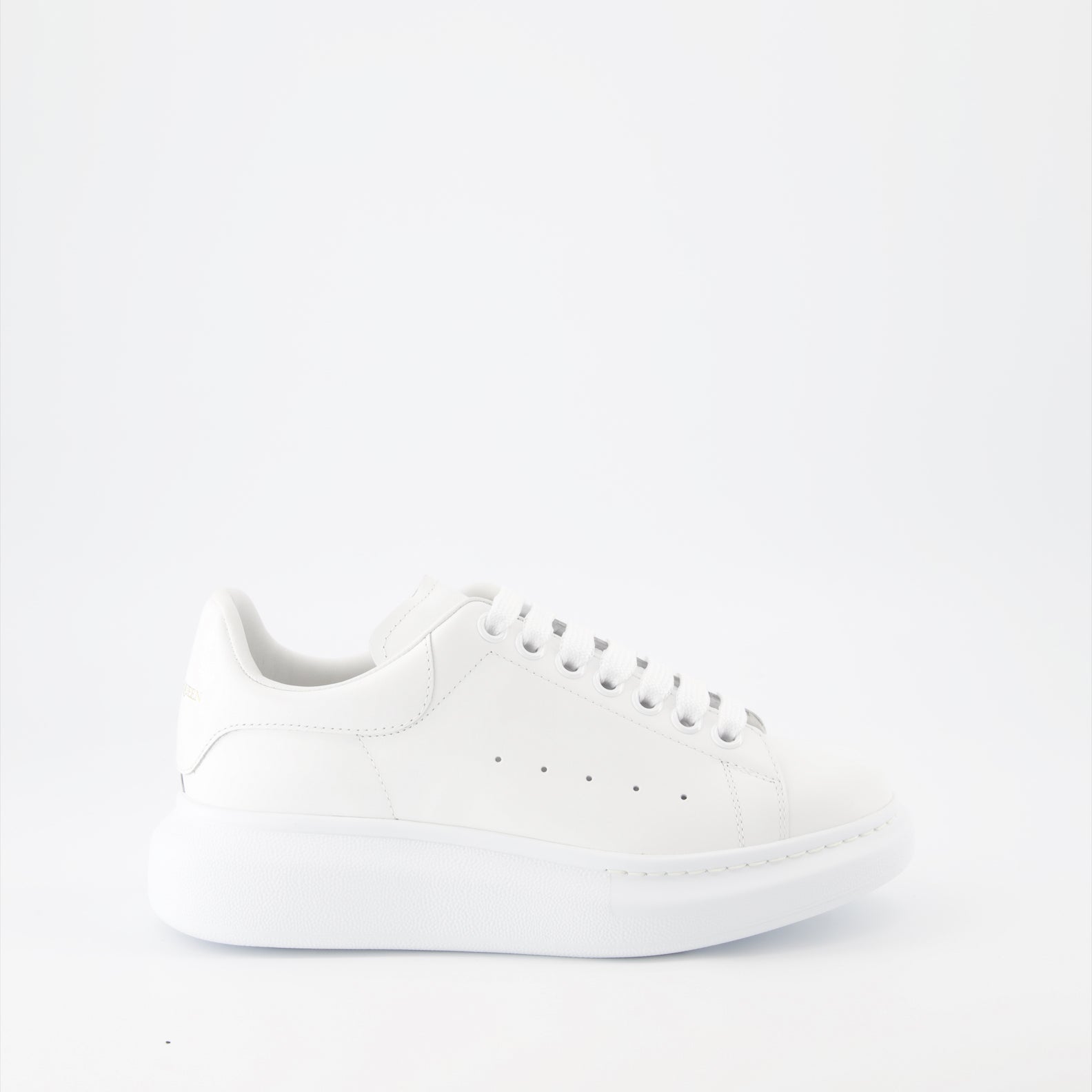 Alexander McQueen sneakers, oversized leather sneakers, white leather sneakers, luxury men's footwear, fashion sneakers