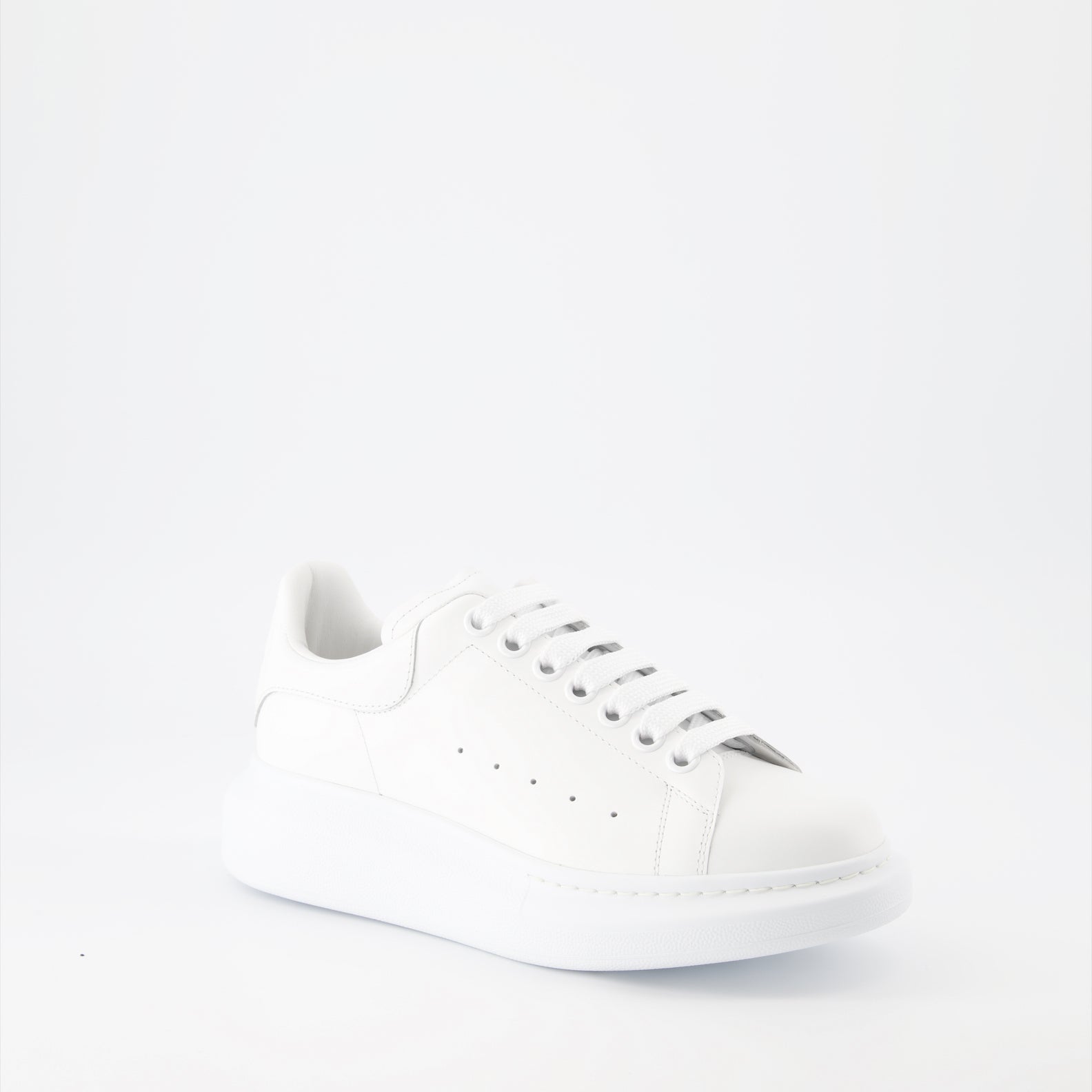 Alexander McQueen sneakers, oversized leather sneakers, white leather sneakers, luxury men's footwear, fashion sneakers
