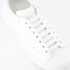 Alexander McQueen sneakers, oversized leather sneakers, white leather sneakers, luxury men's footwear, fashion sneakers