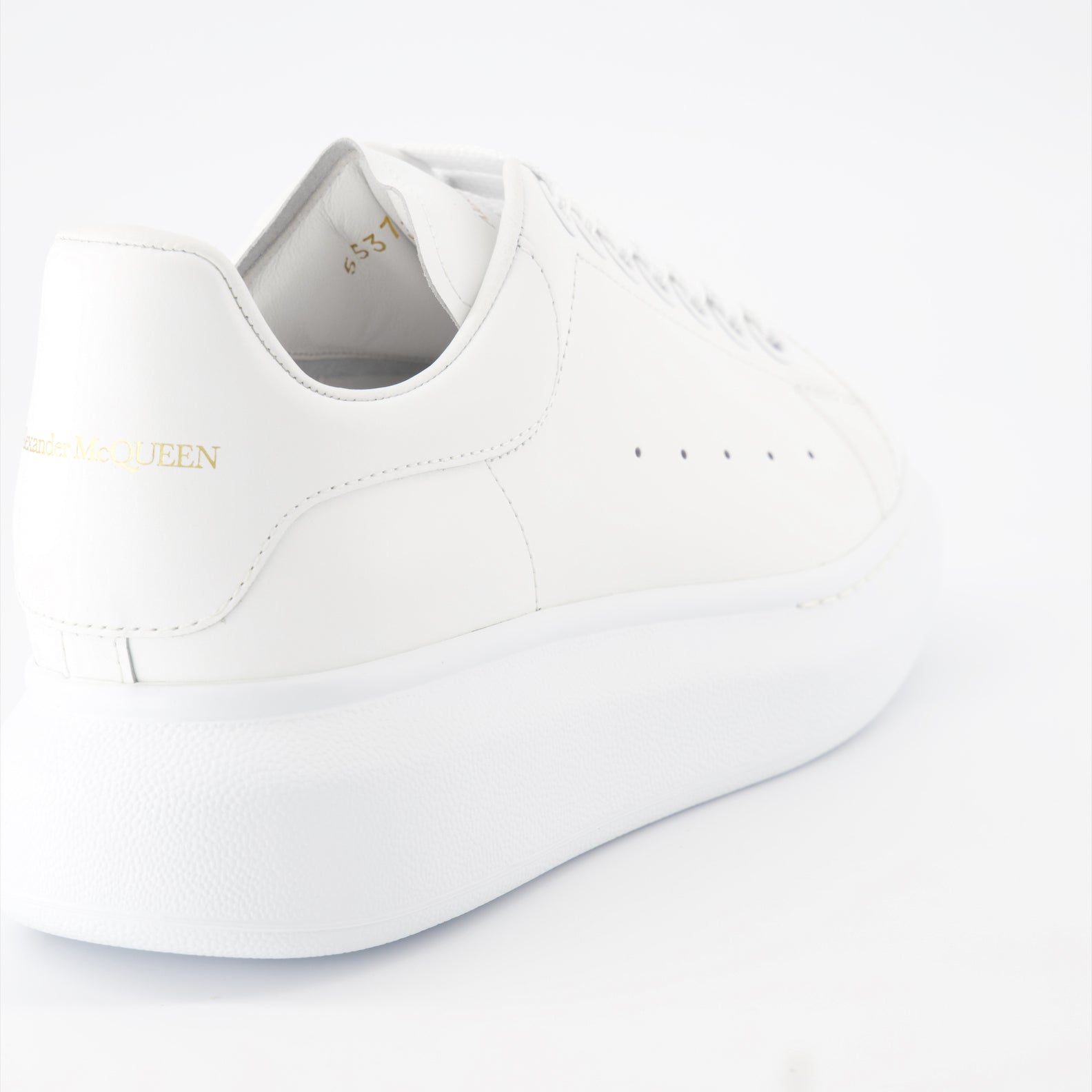 Alexander McQueen sneakers, oversized leather sneakers, white leather sneakers, luxury men's footwear, fashion sneakers