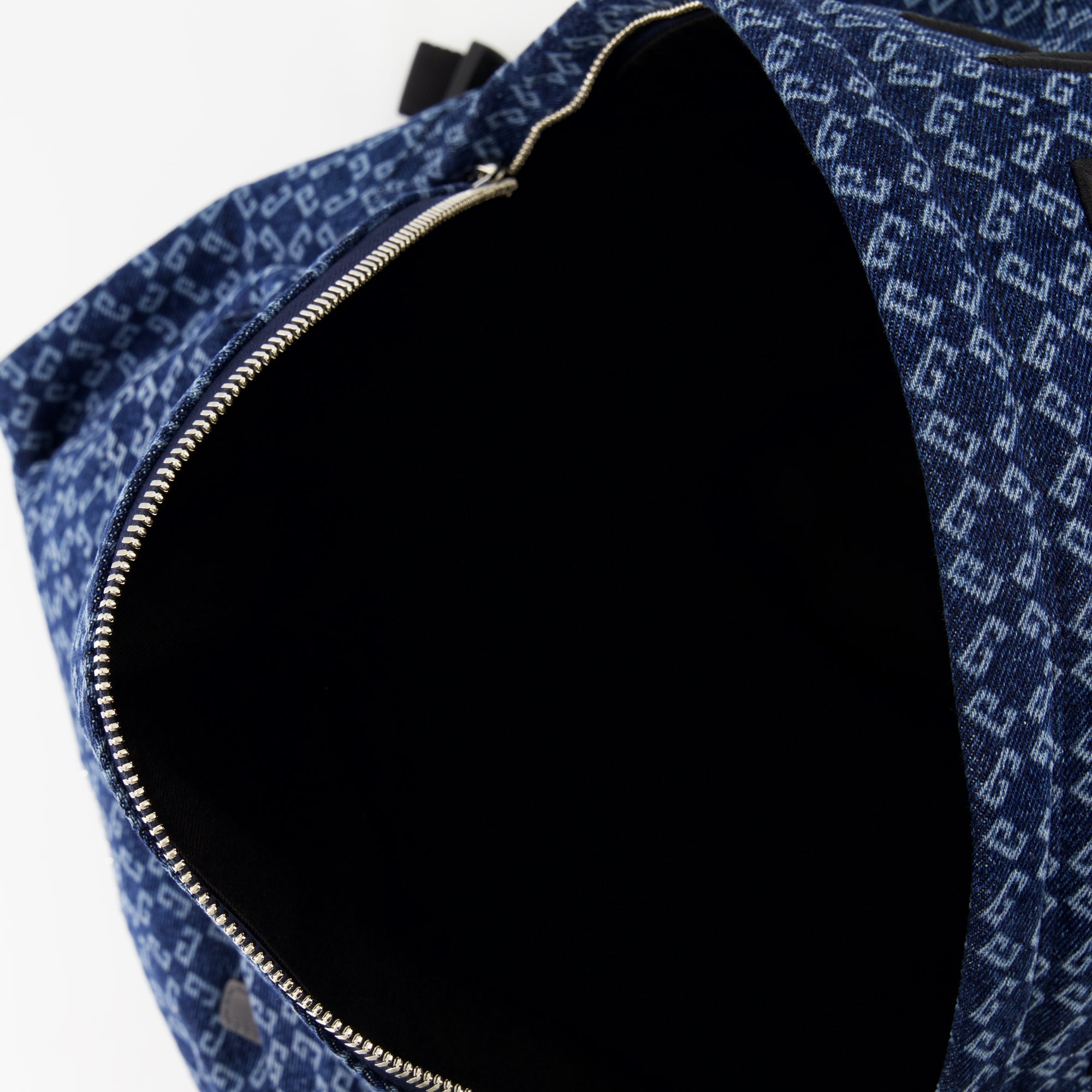 denim backpack, Essential U collection, designer backpack, stylish accessories, practical design