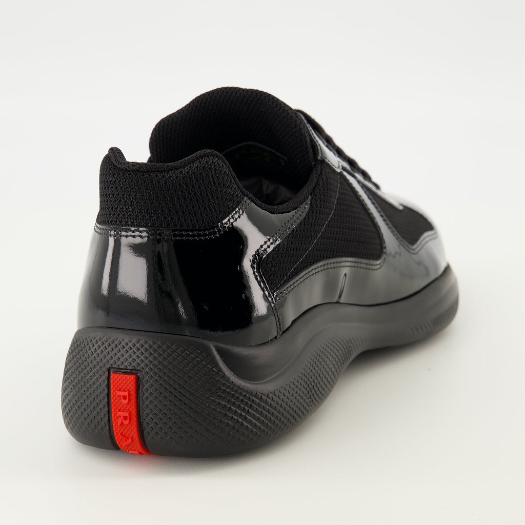 Prada sneakers, black calfskin shoes, sporty footwear, luxury lifestyle, designer sneakers