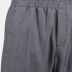 Image of Wool and Silk Sweatpants by Dior for Men - Season Spring-Summer 2025 - Detail View 1