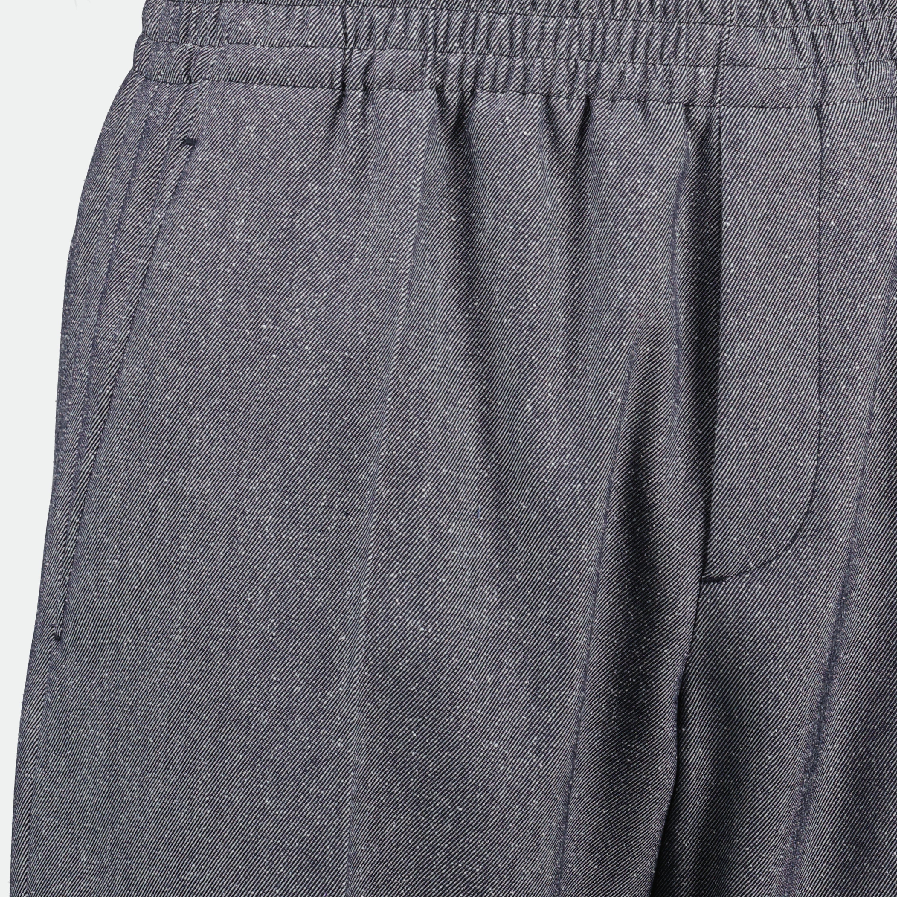 Image of Wool and Silk Sweatpants by Dior for Men - Season Spring-Summer 2025 - Detail View 1