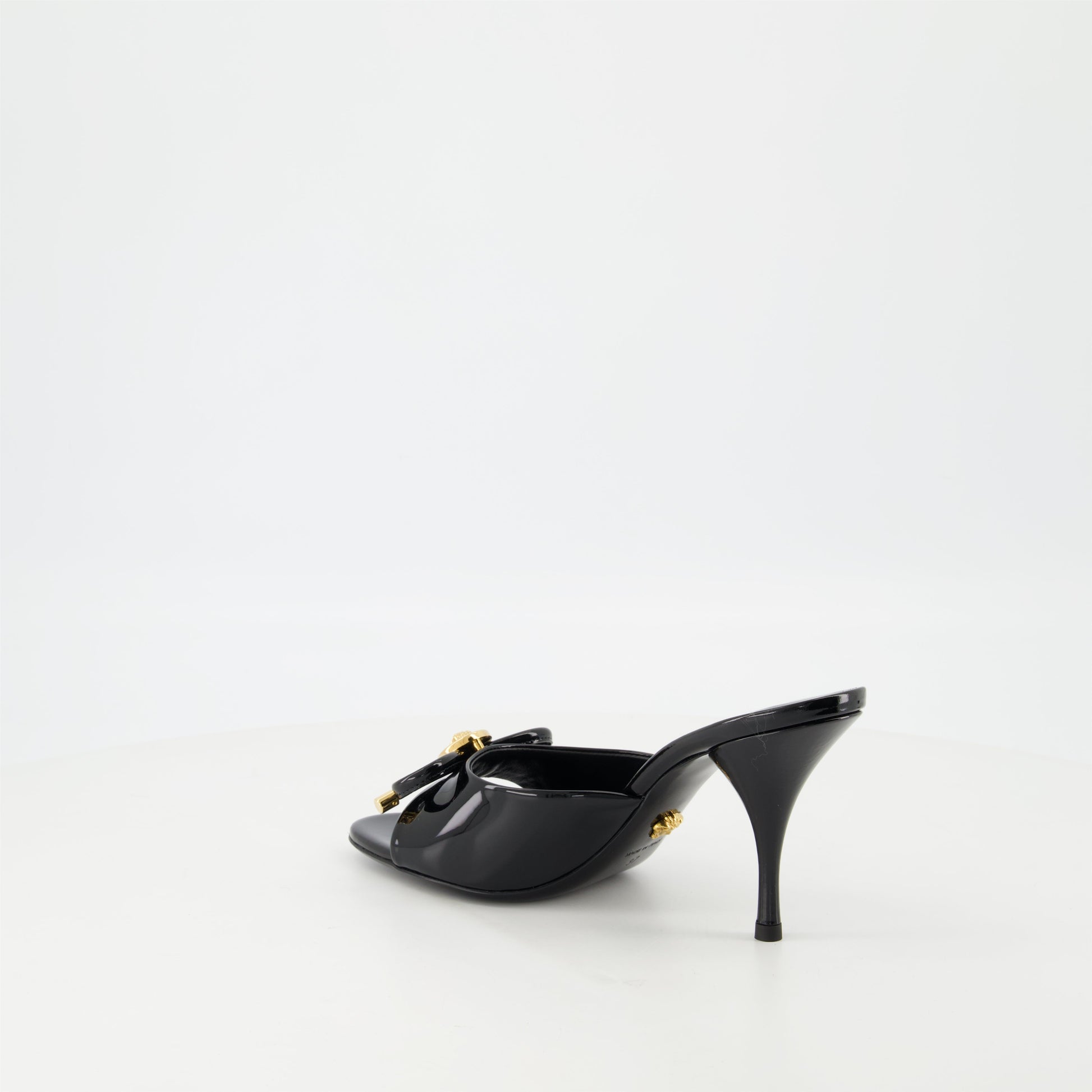 patent leather mules, bow design shoes, Medusa finish footwear, open toe heels, stiletto mules