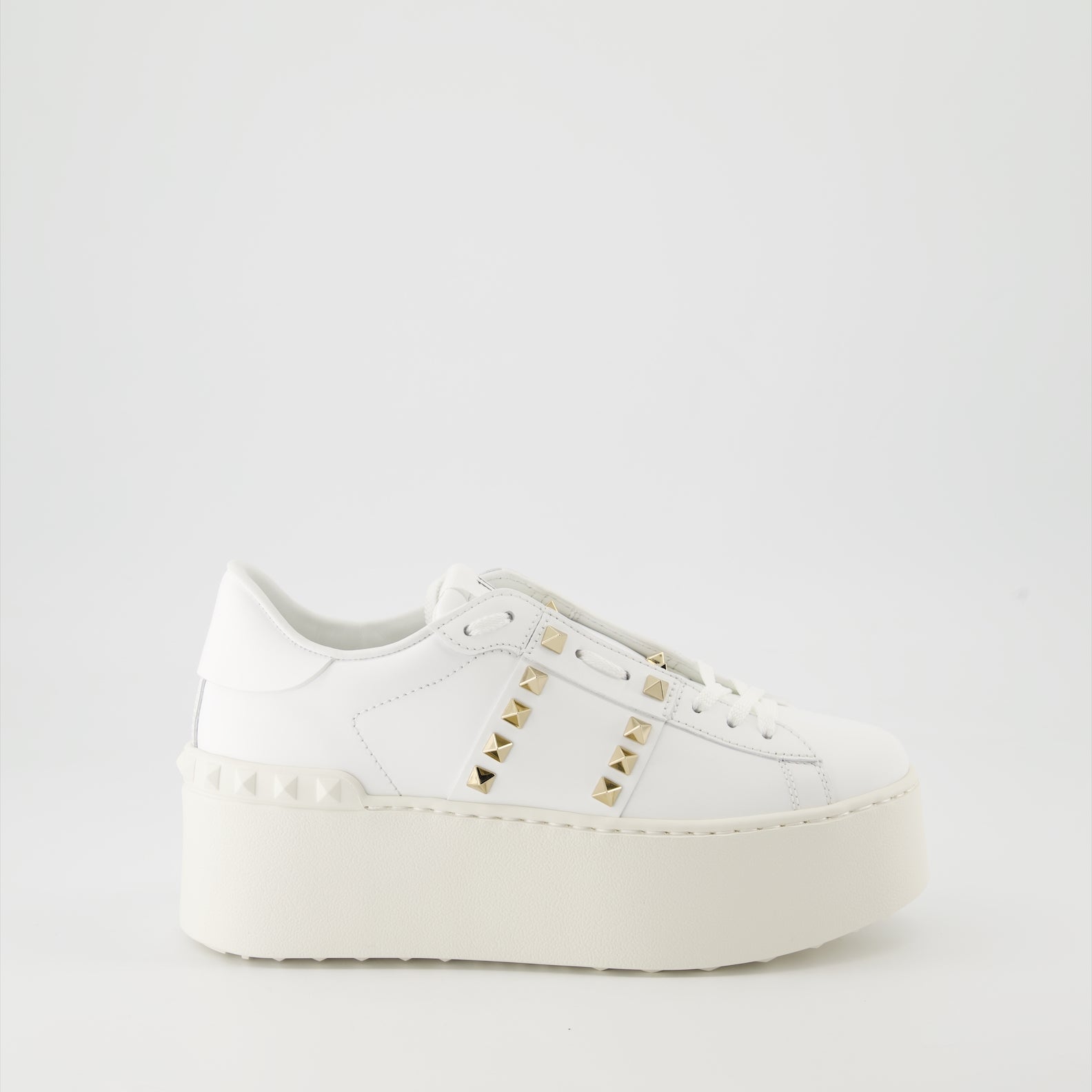 luxurious sneakers, Valentino Garavani, white leather shoes, Rockstud sneakers, flatform sneakers