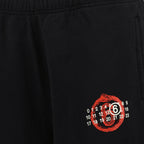 jogger pants, wide-leg pants, MM6 Numeric, black cotton pants, white stitch design